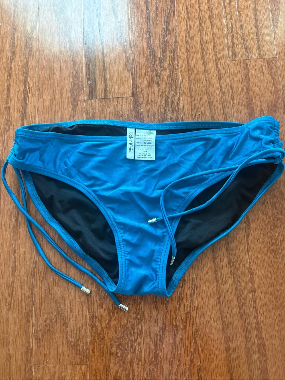 Calvin Klein Men’s Teal Blue Swim Trunks with Side Ties